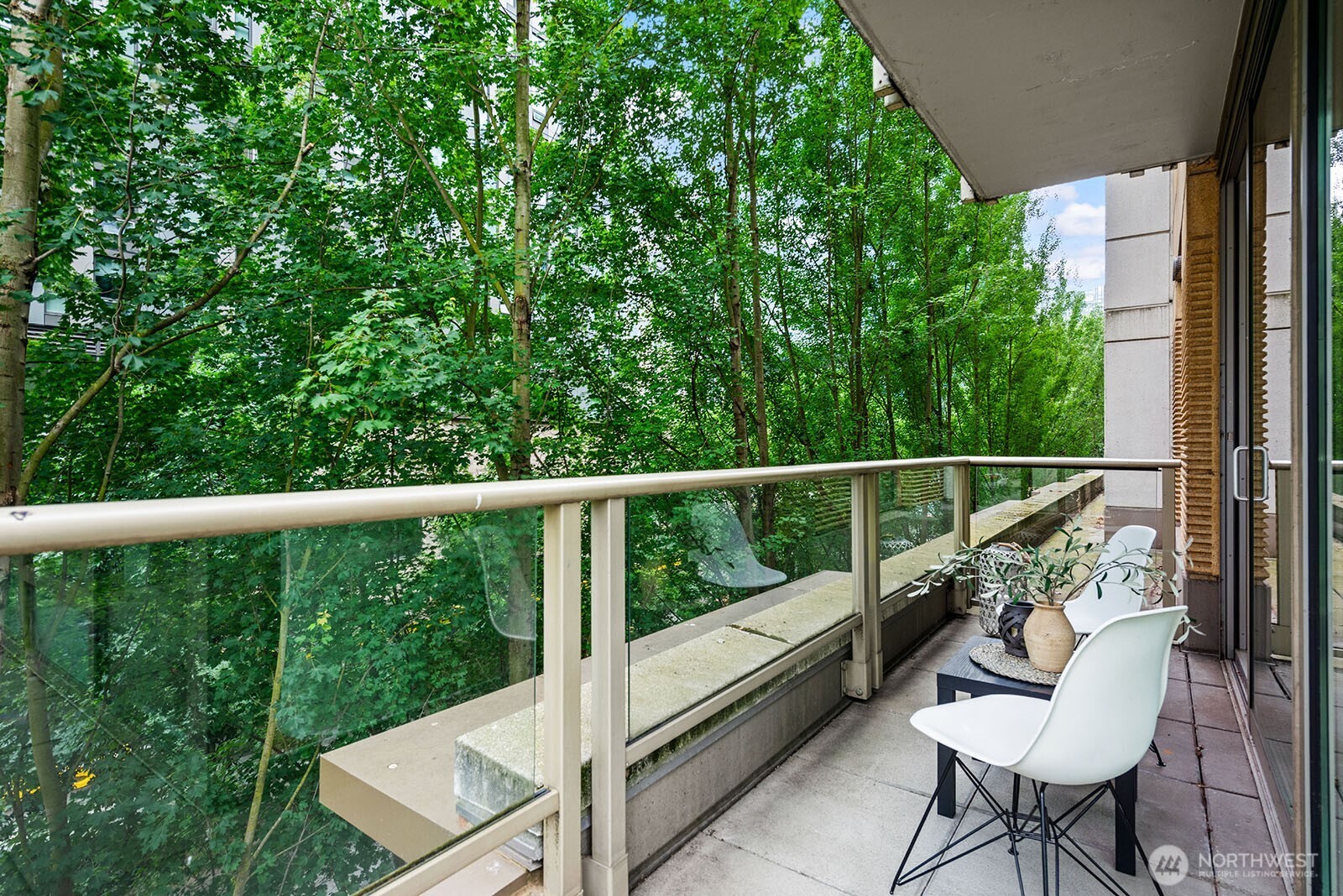 910 Lenora Street, Unit S403 Seattle, WA 98121 - Photo 23 of 40 a view of a two chair in the balcony