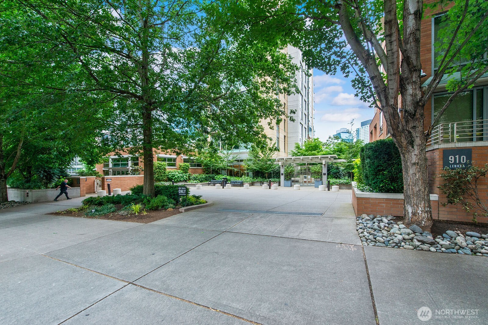 910 Lenora Street, Unit S403 Seattle, WA 98121 - Photo 36 of 40 a view of a street with a tree