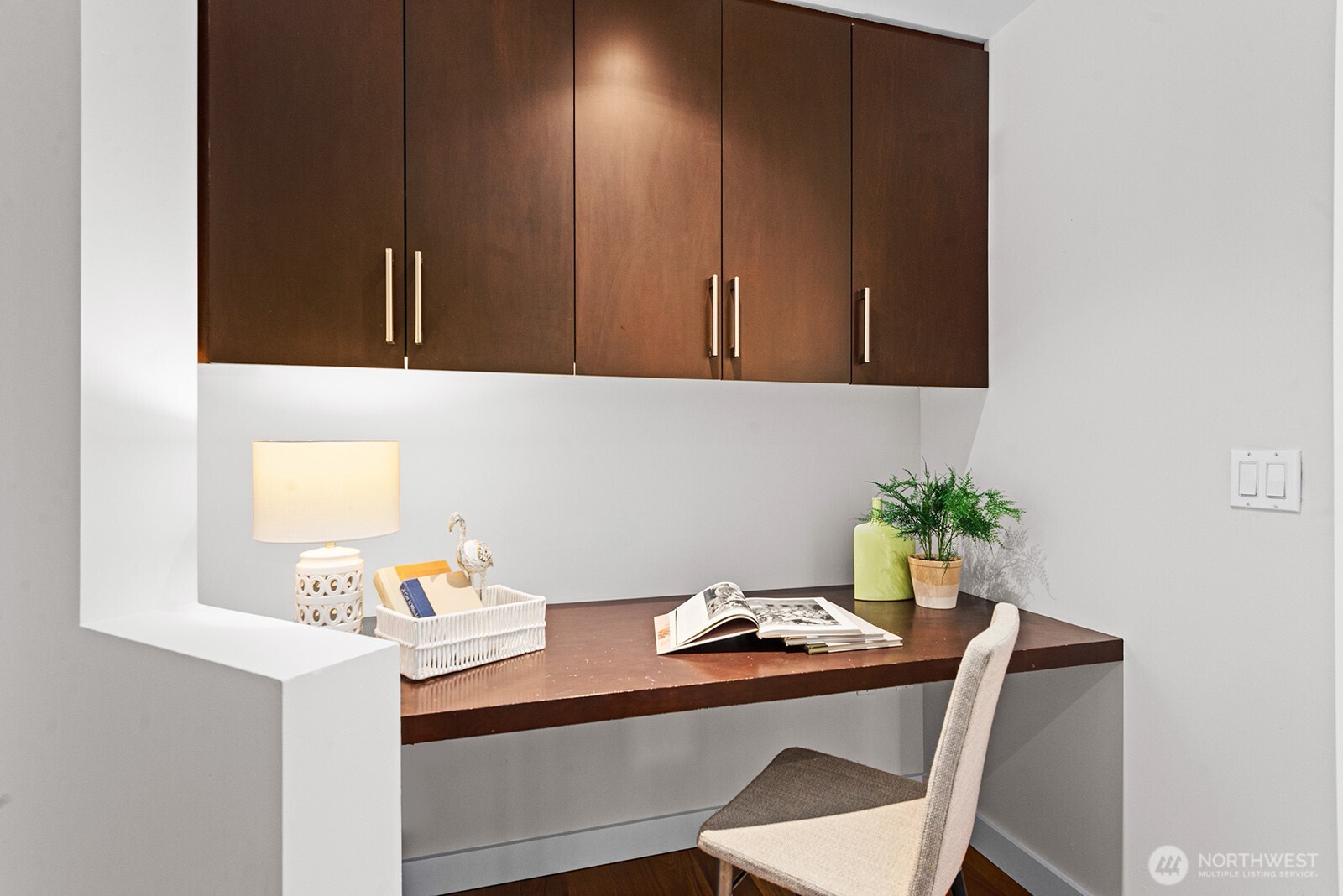 910 Lenora Street, Unit S403 Seattle, WA 98121 - Photo 5 of 40 a room with a table chairs and utility room