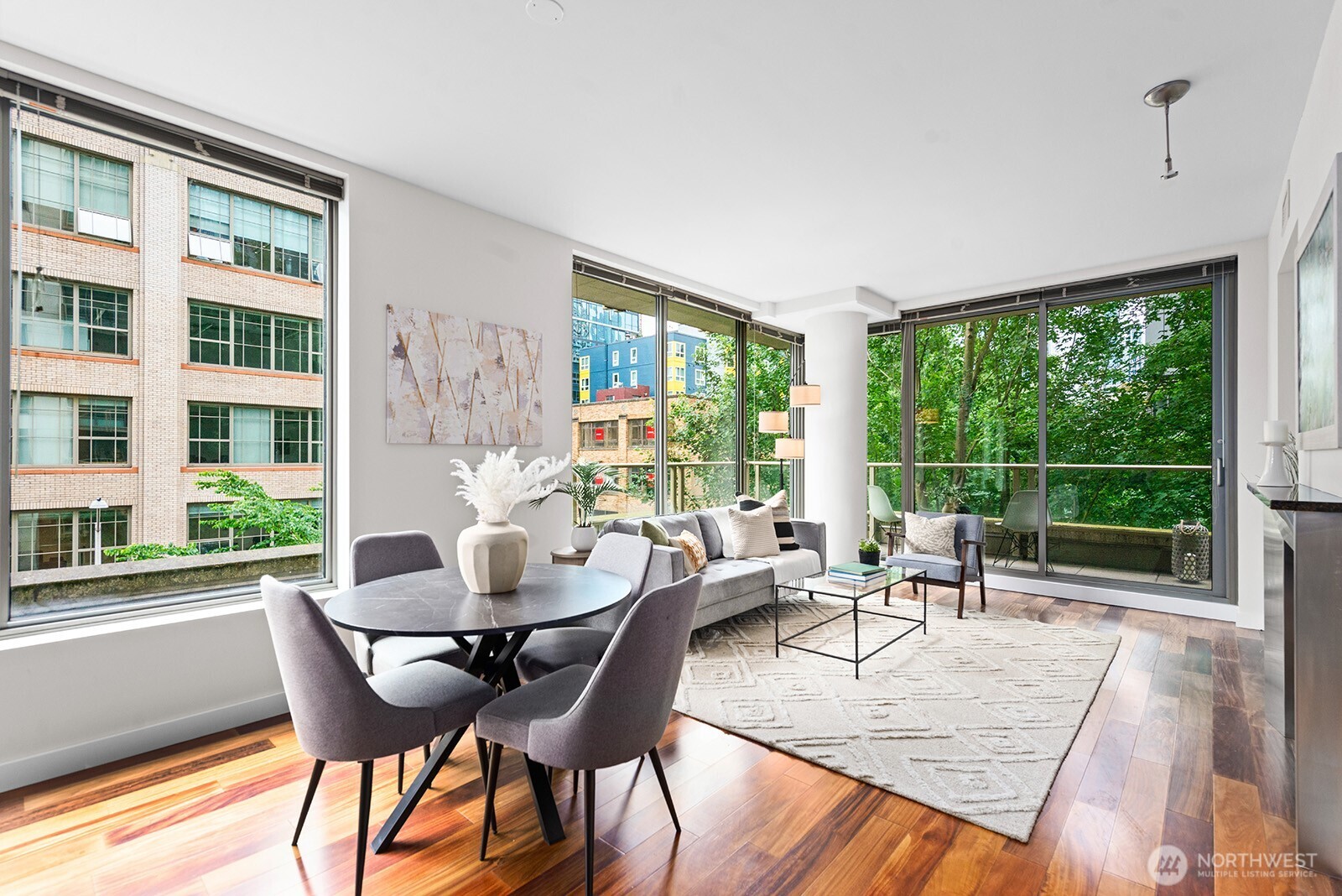 910 Lenora Street, Unit S403 Seattle, WA 98121 - Photo 9 of 40 a dining room with furniture window and outside view