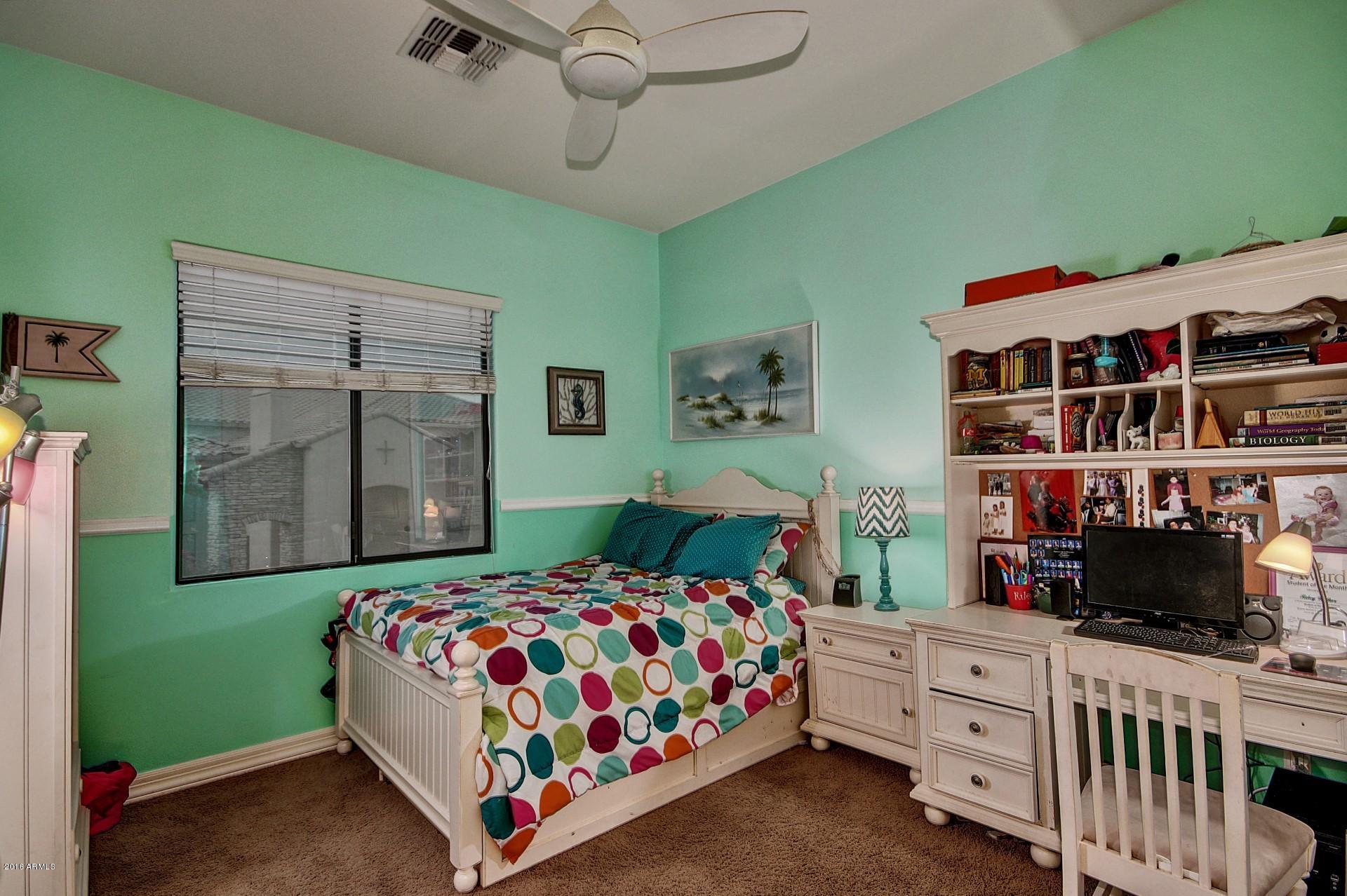 16417 South 23rd Way Phoenix, AZ 85048 - Photo 11 of 32 a bedroom with a bed and a window