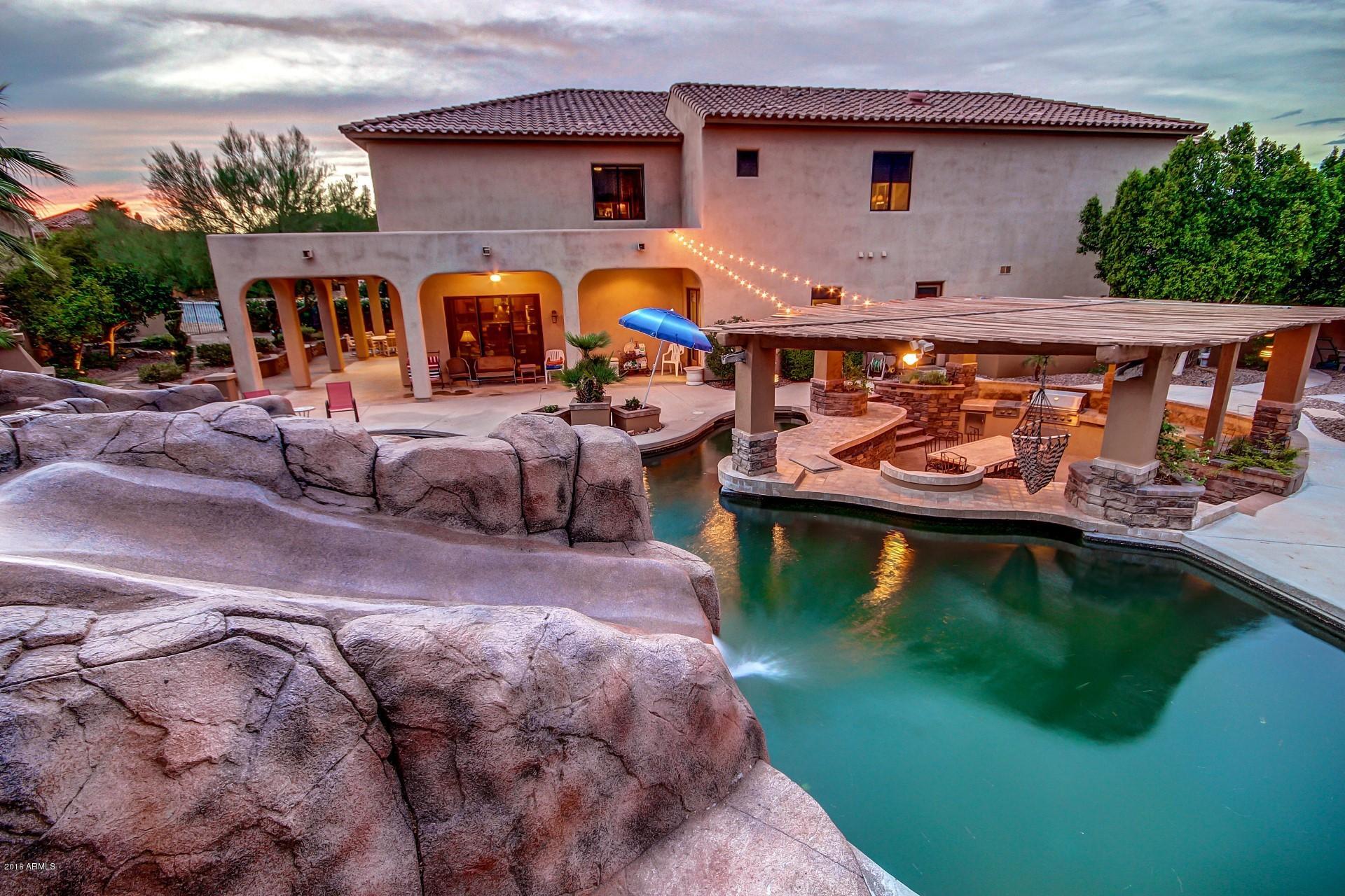 16417 South 23rd Way Phoenix, AZ 85048 - Photo 24 of 32 a front view of house with outdoor space and seating area
