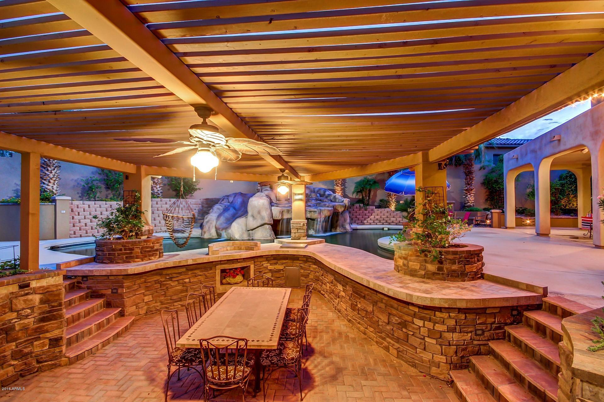 16417 South 23rd Way Phoenix, AZ 85048 - Photo 25 of 32 a view of a swimming pool with outdoor seating