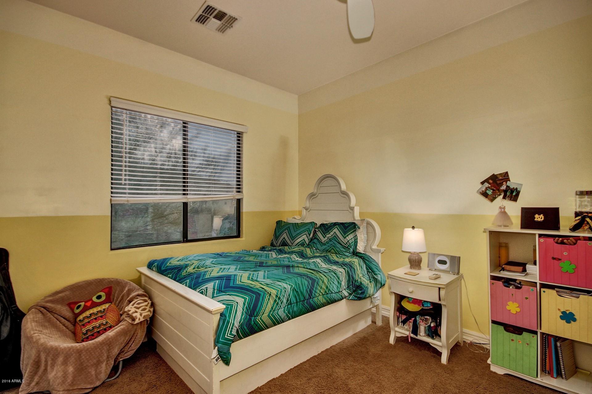 16417 South 23rd Way Phoenix, AZ 85048 - Photo 9 of 32 a bedroom with bed and a window