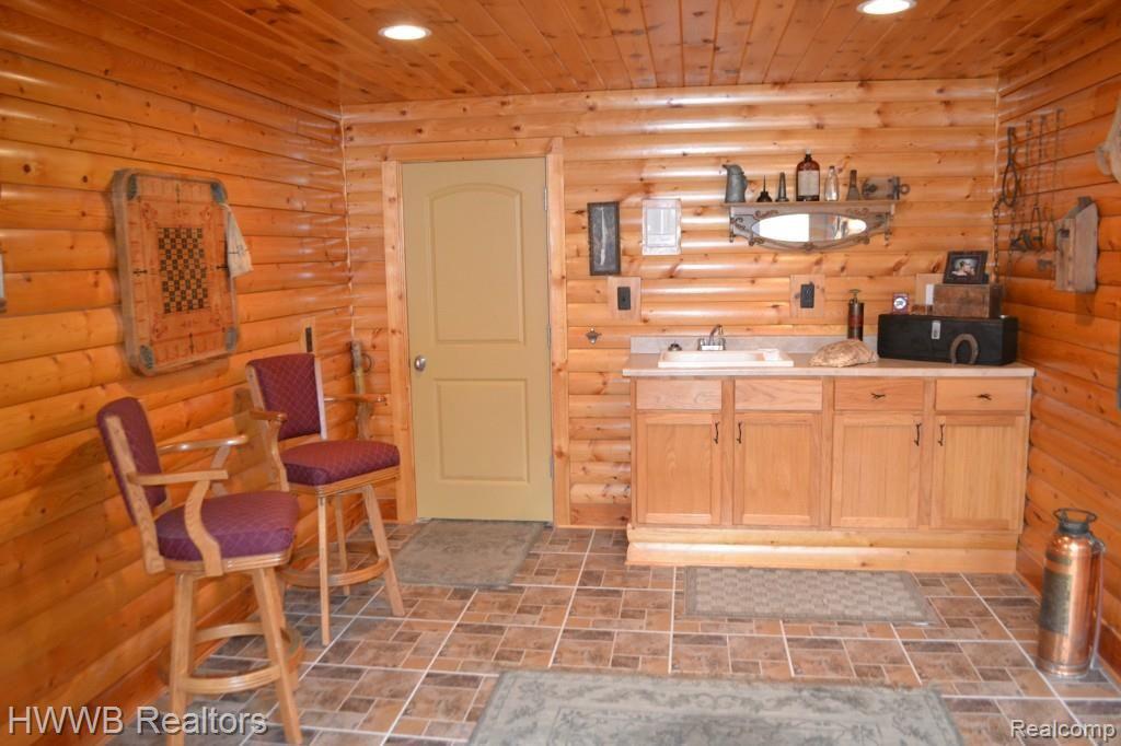 5555 North Livernois Road Rochester, MI 48306 - Photo 42 of 99 Basement Man Cave