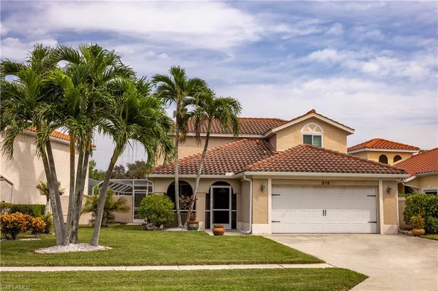 $645,000 | 212 Sabal Lake Drive, Naples, FL 34104