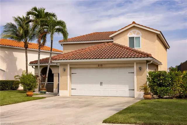 $645,000 | 212 Sabal Lake Drive, Naples, FL 34104