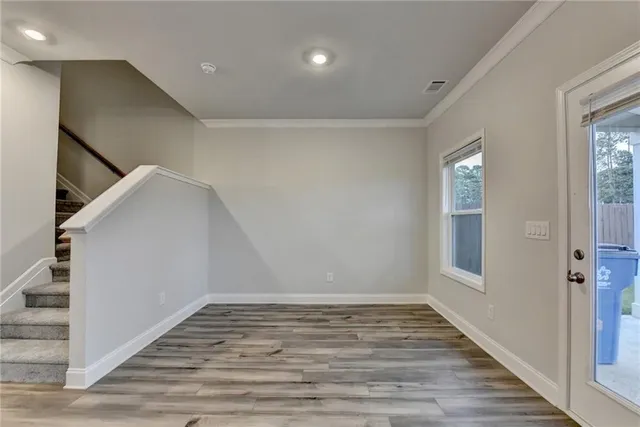 an empty room with windows