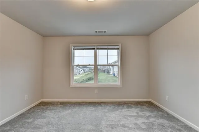 a bathroom with a double vanity sink mirror and shower