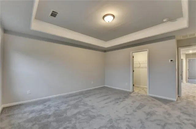 an aerial view of a house with outdoor space