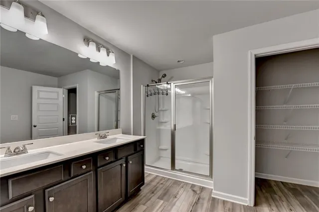 an aerial view of a house with swimming pool and garden