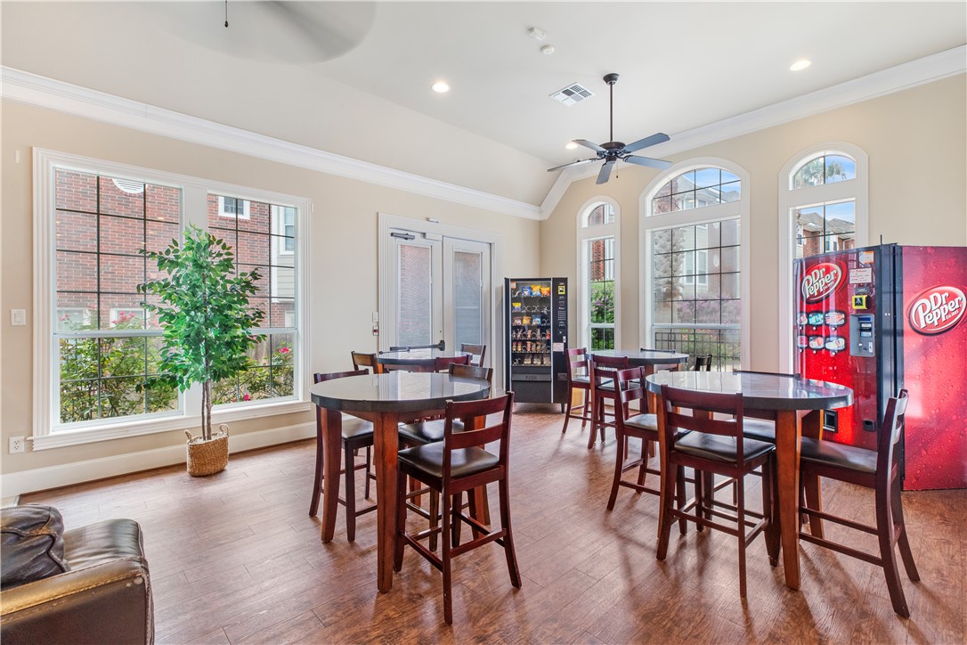 1198 Jones-Butler Road, Unit 1811 College Station, TX 77840 - Photo 21 of 26 a view of a a dining room with furniture window and wooden floor