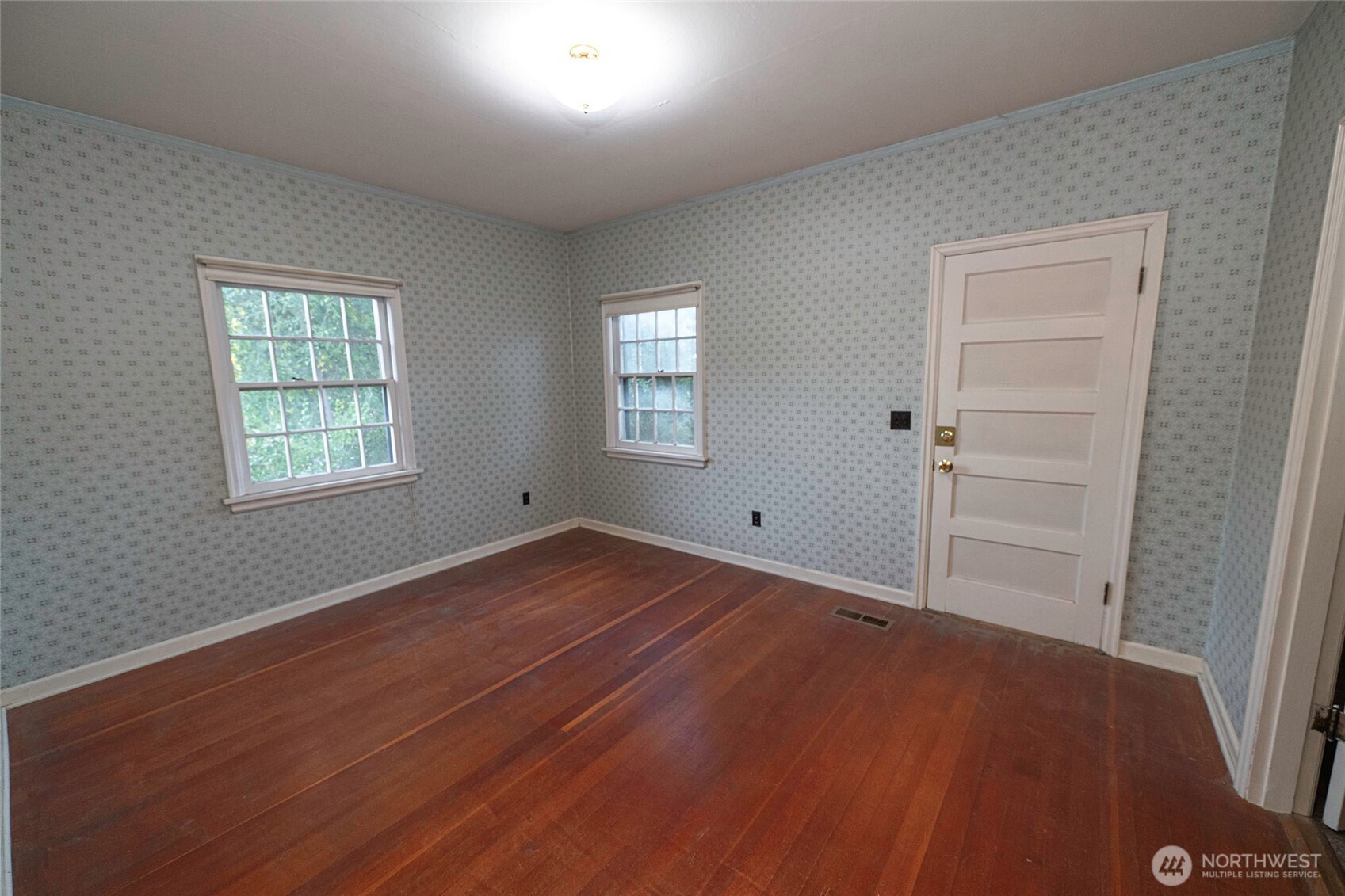 40 Northwest B Street College Place, WA 99324 - Photo 14 of 29 a view of empty room with window and wooden floor