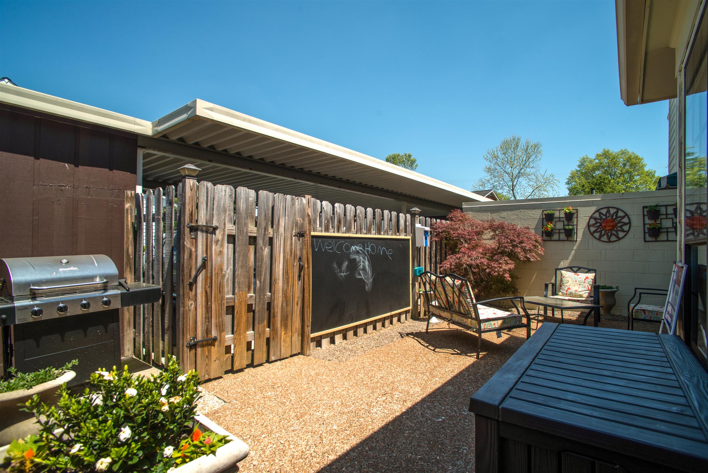 1224 General George Patton Road Nashville, TN 37221 - Photo 27 of 29 a backyard of a house with seating space