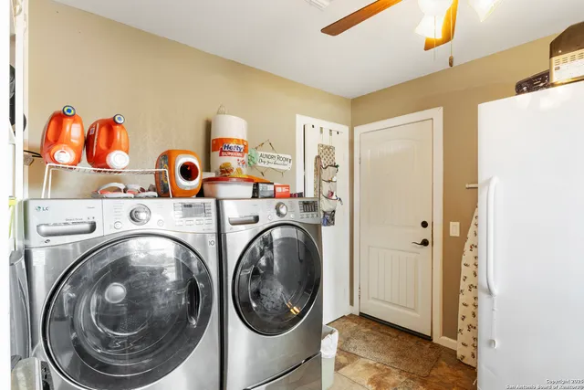 a utility room with dryer and washer