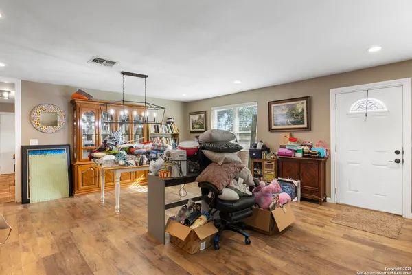 a living room with furniture and a window
