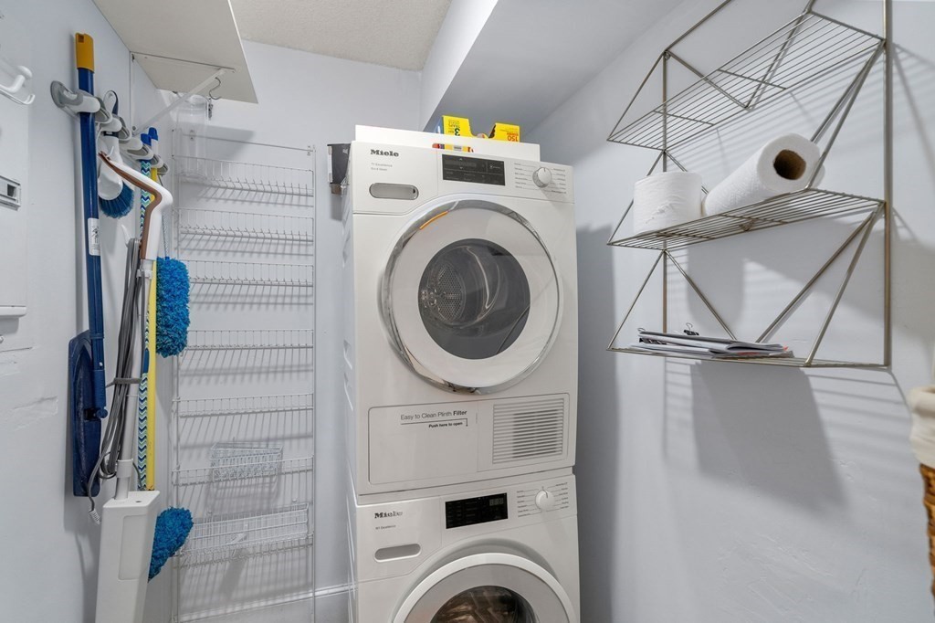 91 Fayette Street, Unit 91 Watertown, MA 02472 - Photo 11 of 21 a view of a storage & utility room with a washer dryer