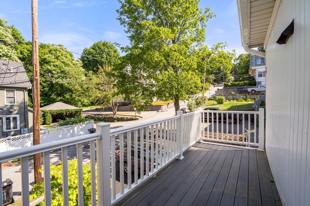 91 Fayette Street, Unit 91 Watertown, MA 02472 - Photo 20 of 21 a view of a balcony with wooden floor