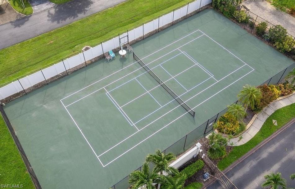 76 Atlantic Way, Unit 76 Naples, FL 34104 - Photo 4 of 18 a view of a backyard