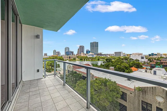 a bathroom with a sink mirror and vanity