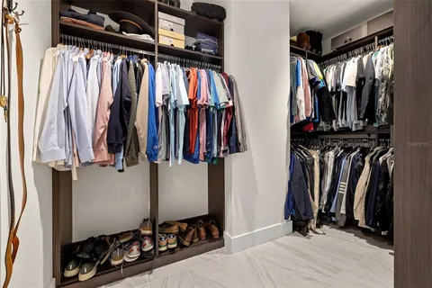a bathroom with a sink vanity and mirror
