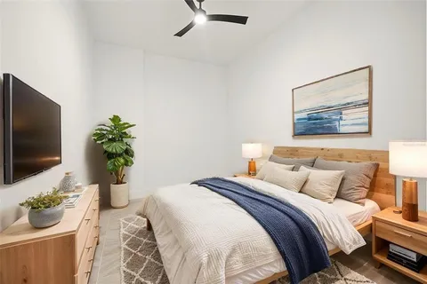 a view of a storage & utility room with a washer dryer