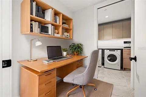 a view of a chairs and table on the terrace