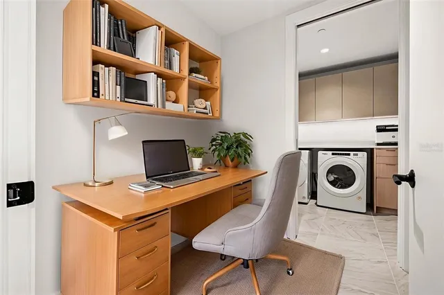 a view of a chairs and table on the terrace