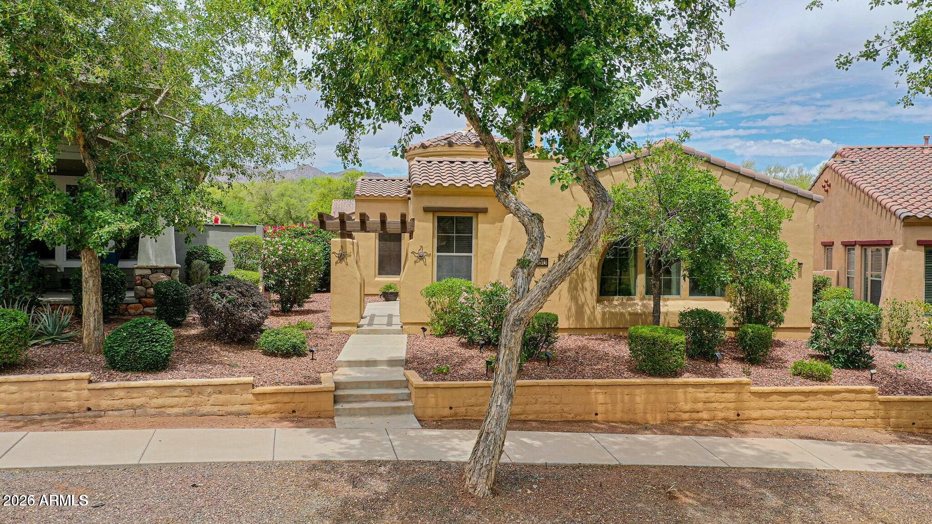 3950 North Edith Way Buckeye, AZ 85396 - Photo 1 of 32 front view of a house with a street