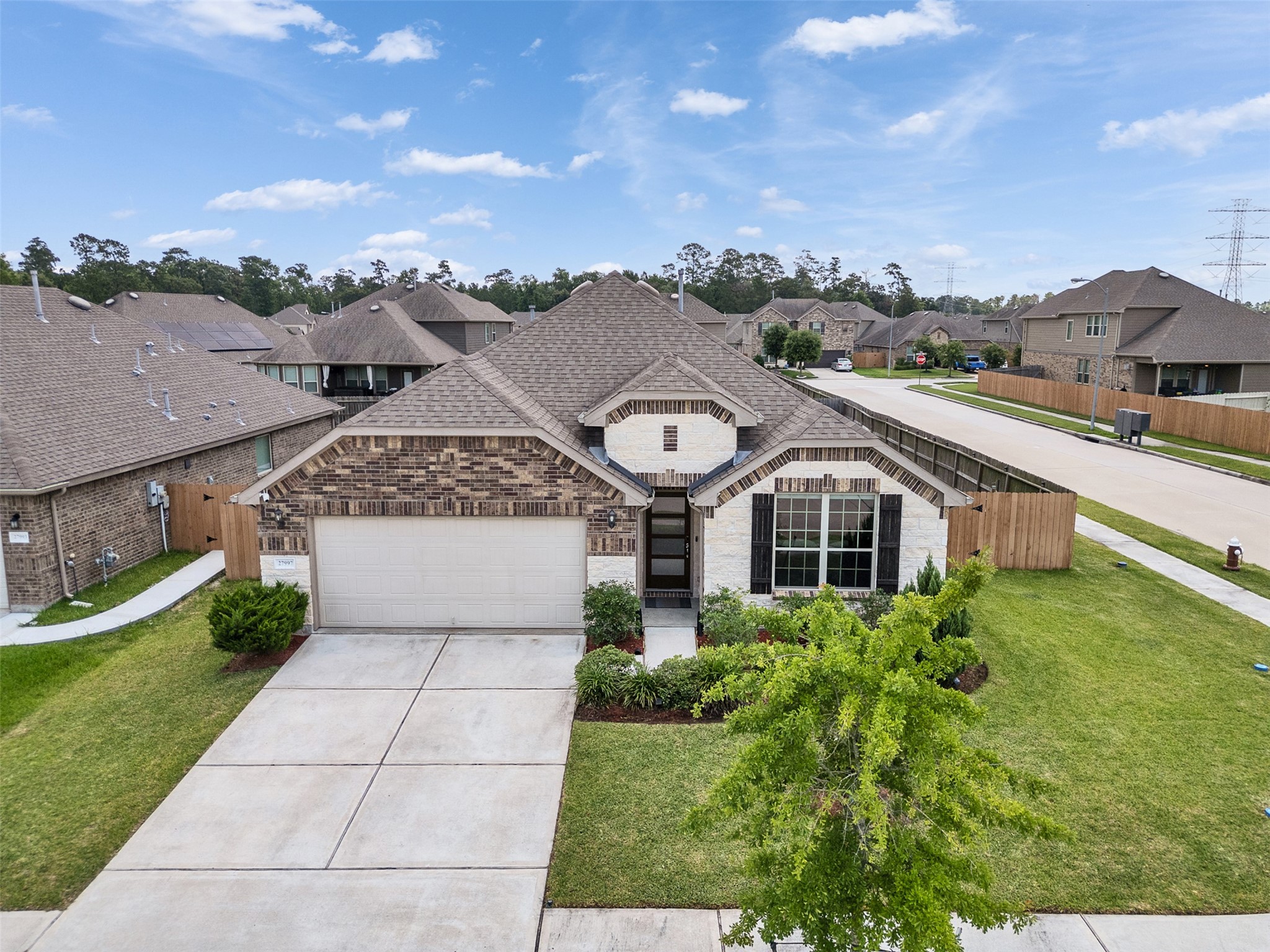 27997 Lone Hollow Lane Spring, TX 77386 - Photo 1 of 45 an aerial view of a house