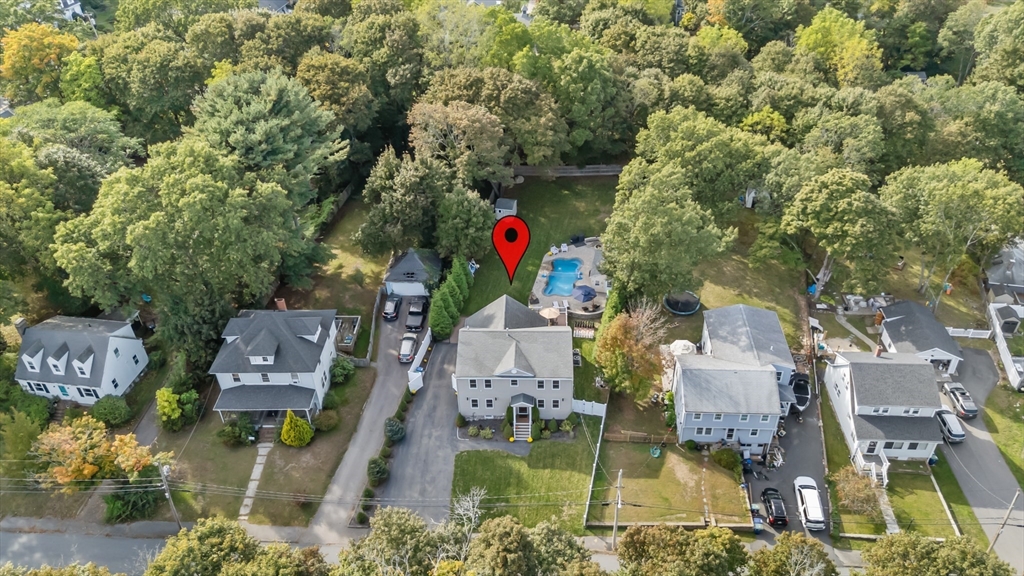 51 Faxon Street Braintree, MA 02184 - Photo 2 of 31 an aerial view of houses with yard