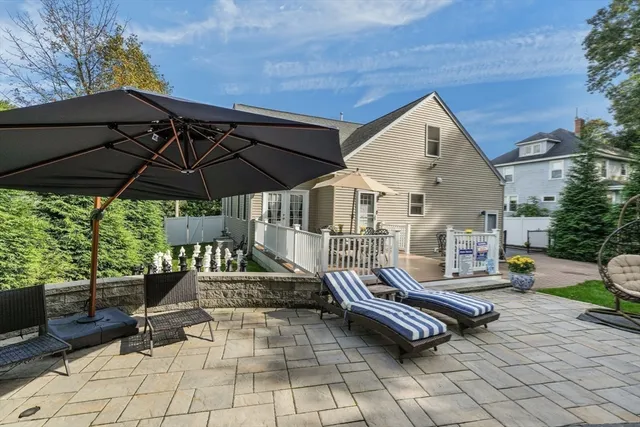 a backyard of a house with seating space