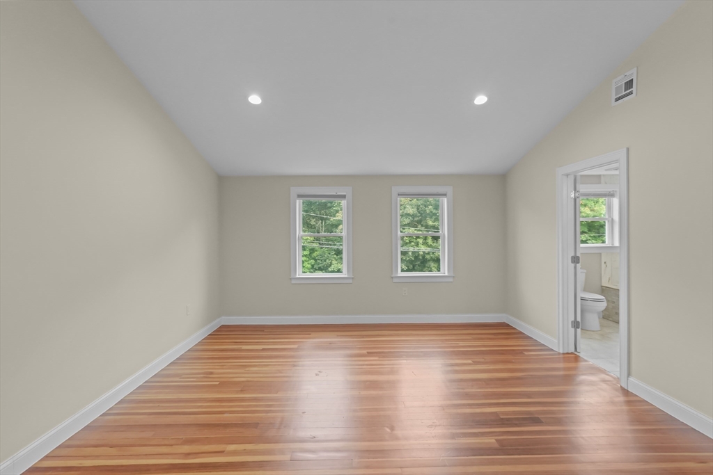 51 Faxon Street Braintree, MA 02184 - Photo 10 of 31 wooden floor in an empty room with a window