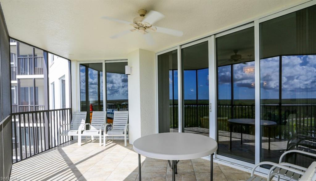 1060 Borghese Lane, Unit 603 Naples, FL 34114 - Photo 21 of 50 Sunroom / solarium featuring ceiling fan
