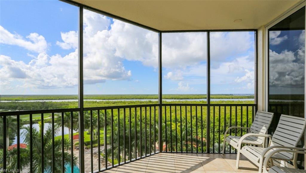 1060 Borghese Lane, Unit 603 Naples, FL 34114 - Photo 23 of 50 Unfurnished sunroom featuring a rural view