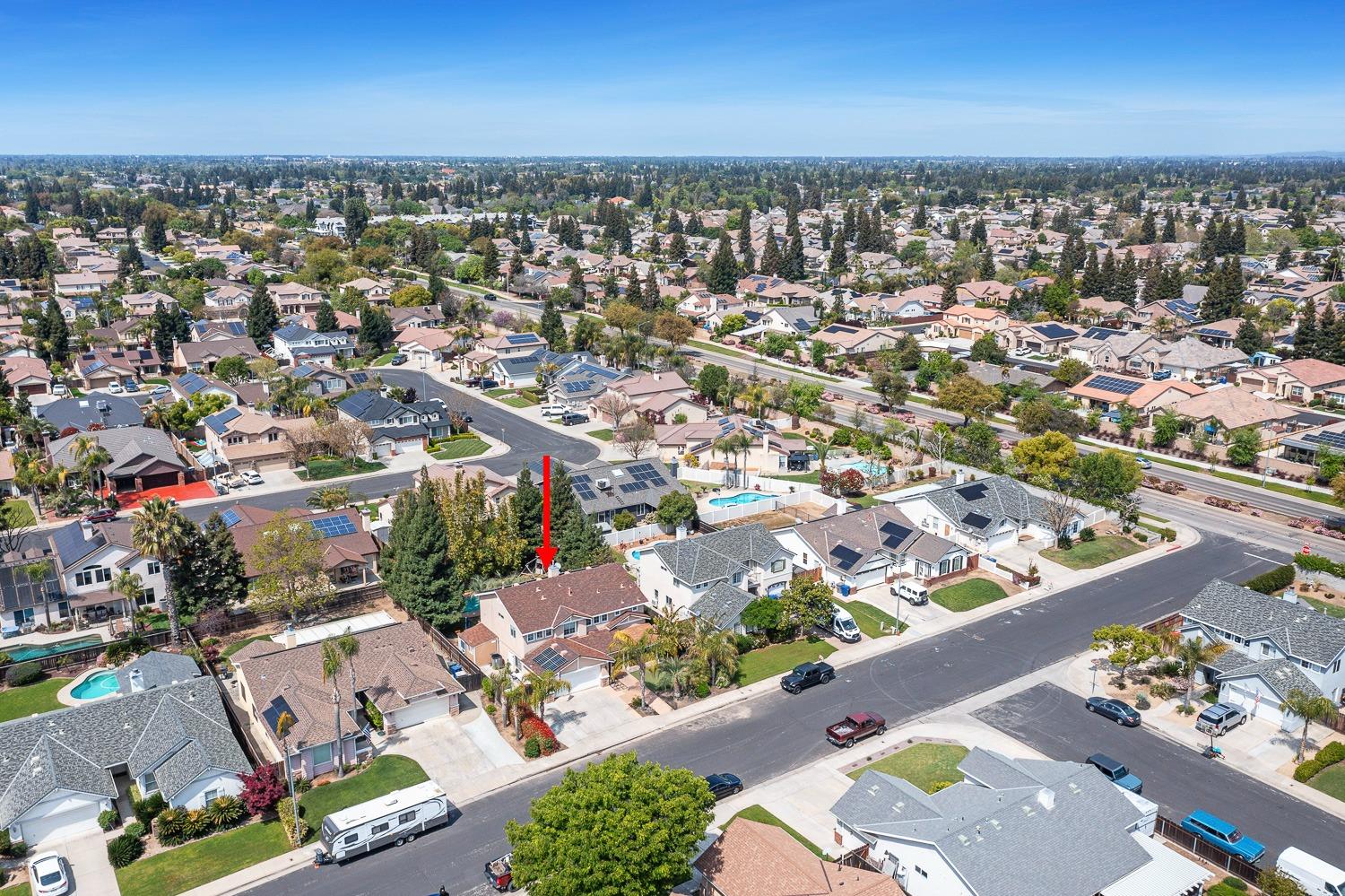 3232 Greenfield Avenue Clovis, CA 93611 - Photo 38 of 38 an aerial view of a city with lots of residential buildings