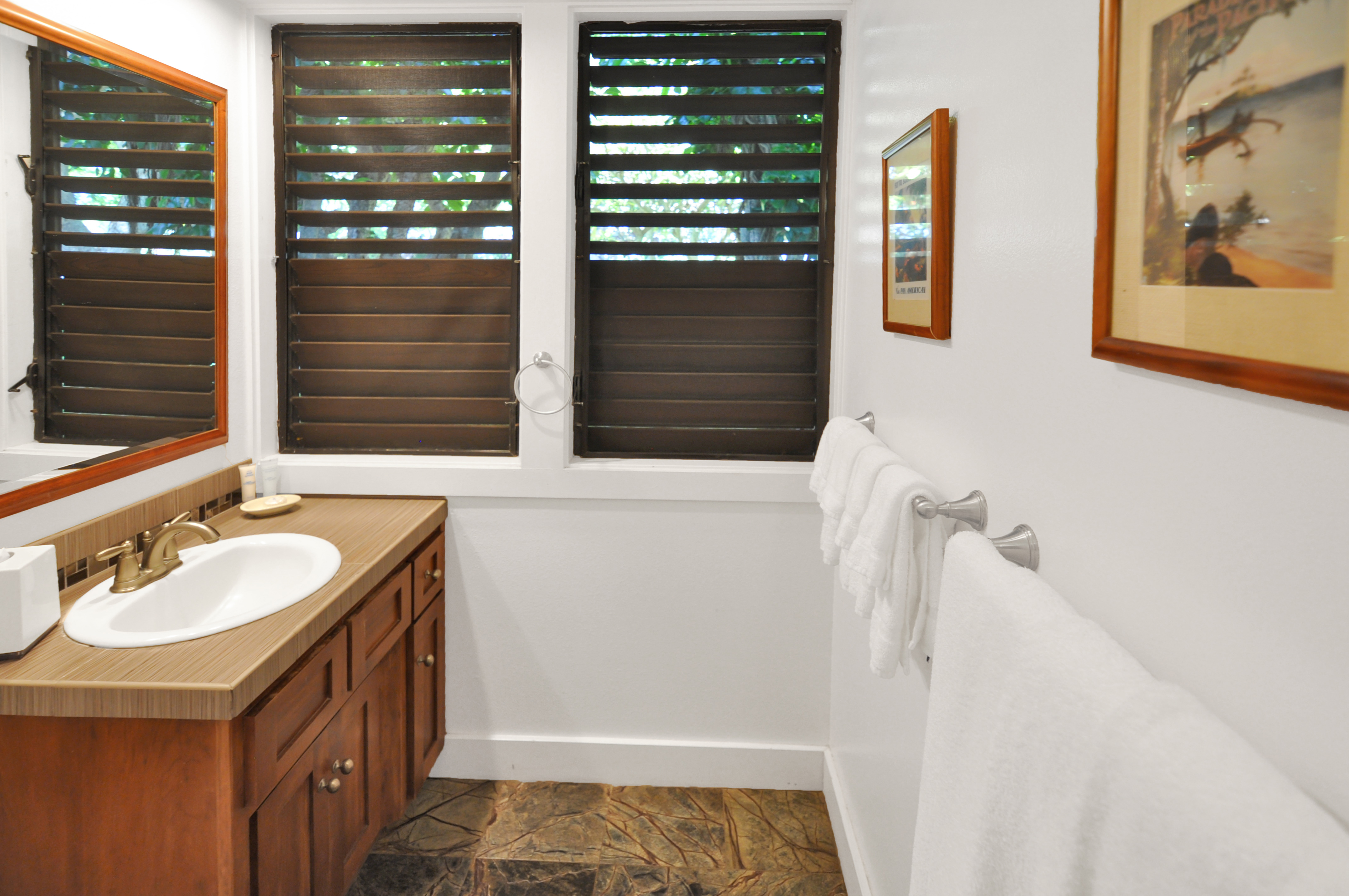 2253 Poipu Road, Unit 244 Koloa, HI 96756 - Photo 14 of 20 a bathroom with a sink and a mirror