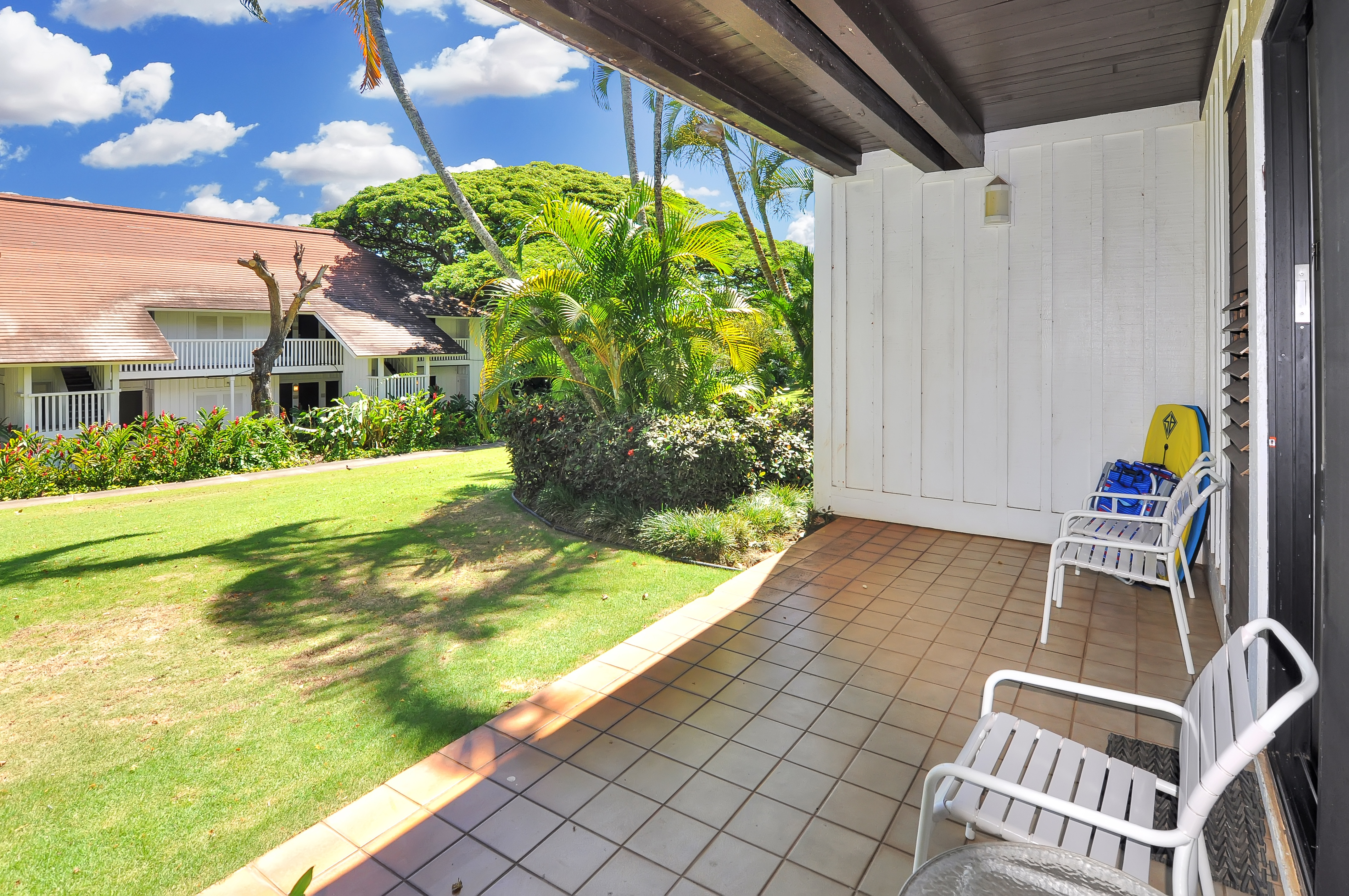 2253 Poipu Road, Unit 244 Koloa, HI 96756 - Photo 20 of 20 a view of house with backyard outdoor seating and swimming pool