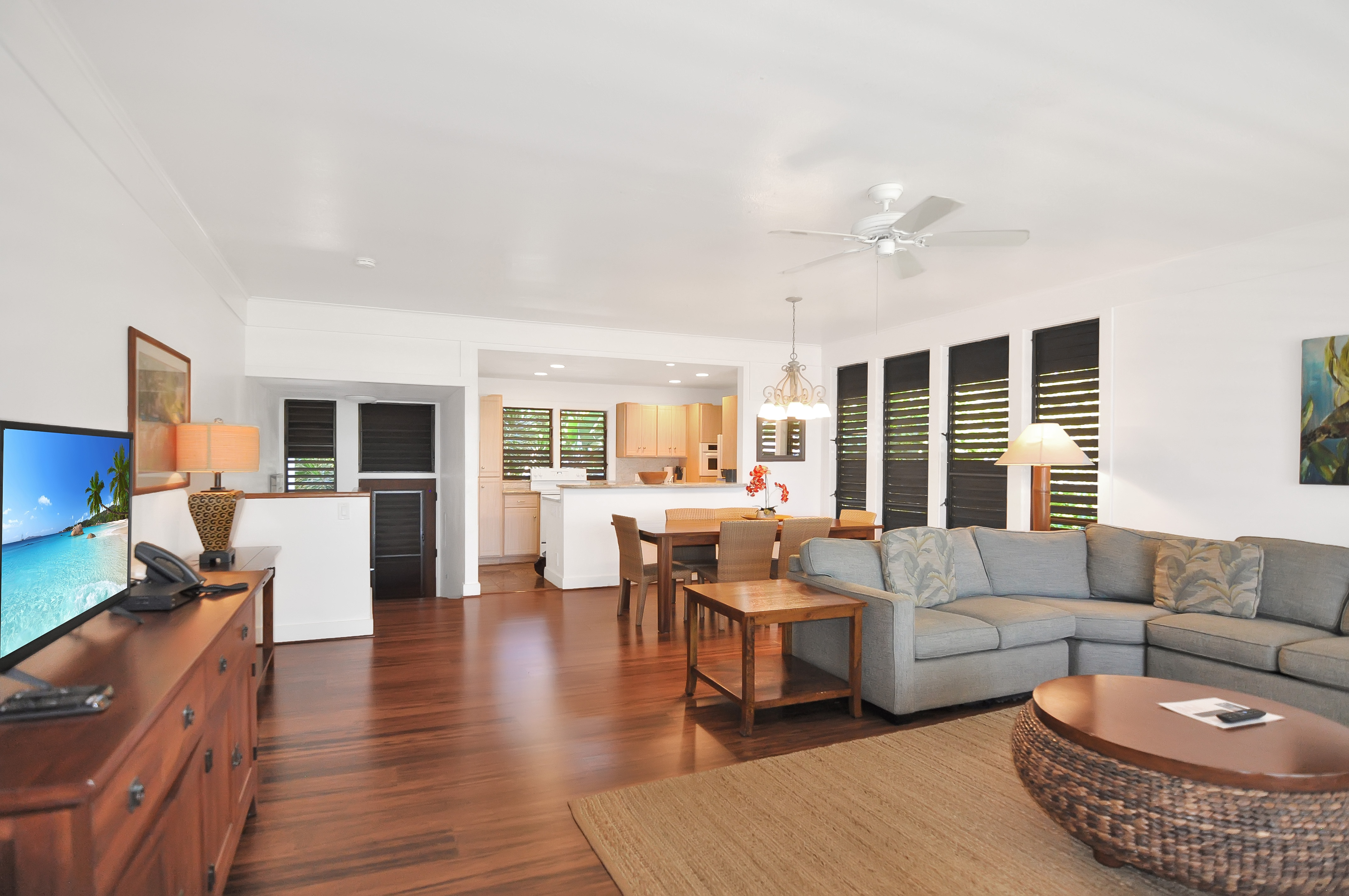 2253 Poipu Road, Unit 244 Koloa, HI 96756 - Photo 3 of 20 a living room with furniture and a large window