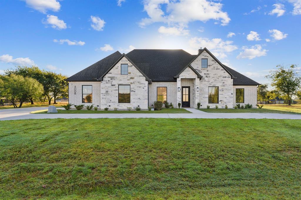 8008 Ben Day Murrin Road Fort Worth, TX 76126 - Photo 37 of 40 a front view of house with yard and green space