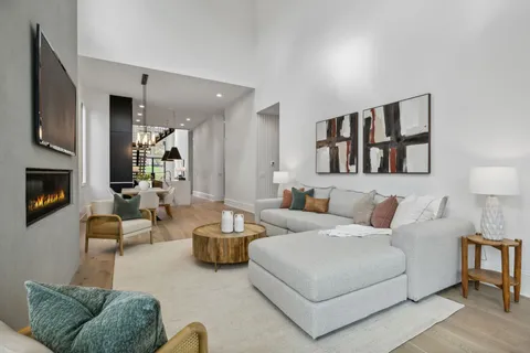 a spacious bedroom with a bed and a couch