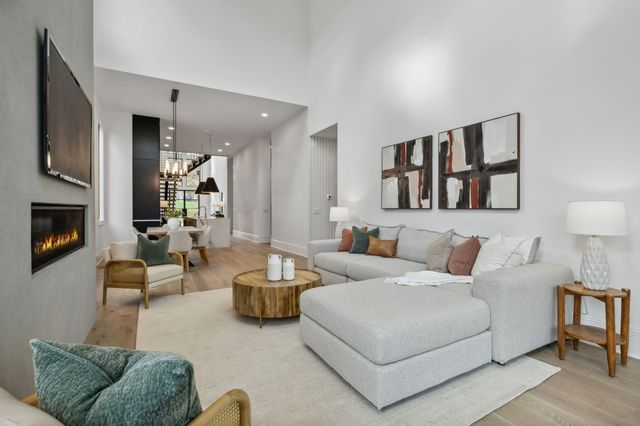 a spacious bedroom with a bed and a couch