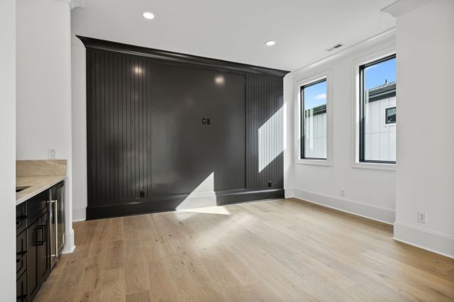 a view of house with outdoor space and swimming pool