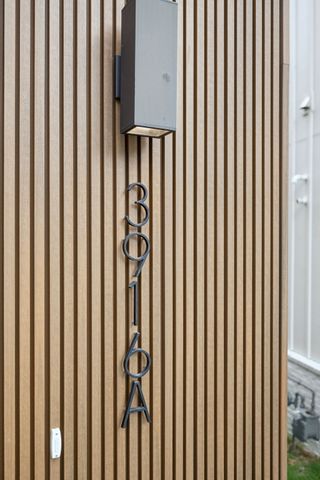 a open kitchen with a sink a window and stainless steel appliances