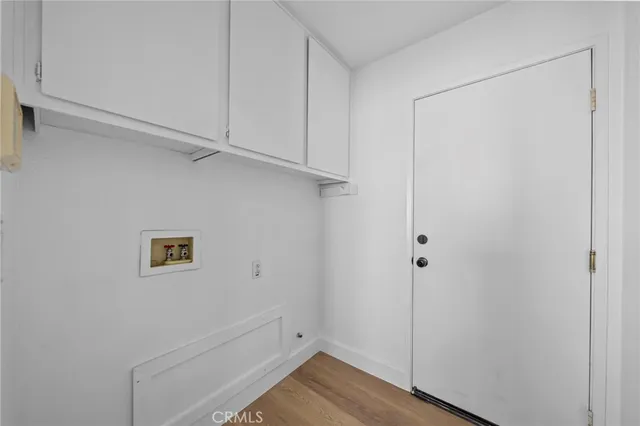 a view of small space with wooden floor