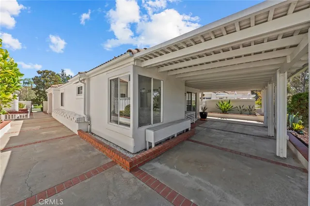 a view of a large white building with a large windows
