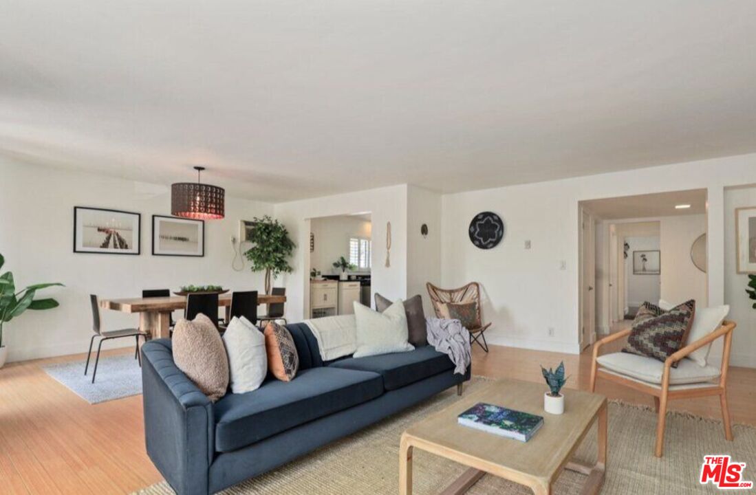 6624 South Springpark Avenue, Unit 5A Los Angeles, CA 90056 - Photo 1 of 23 a living room with furniture