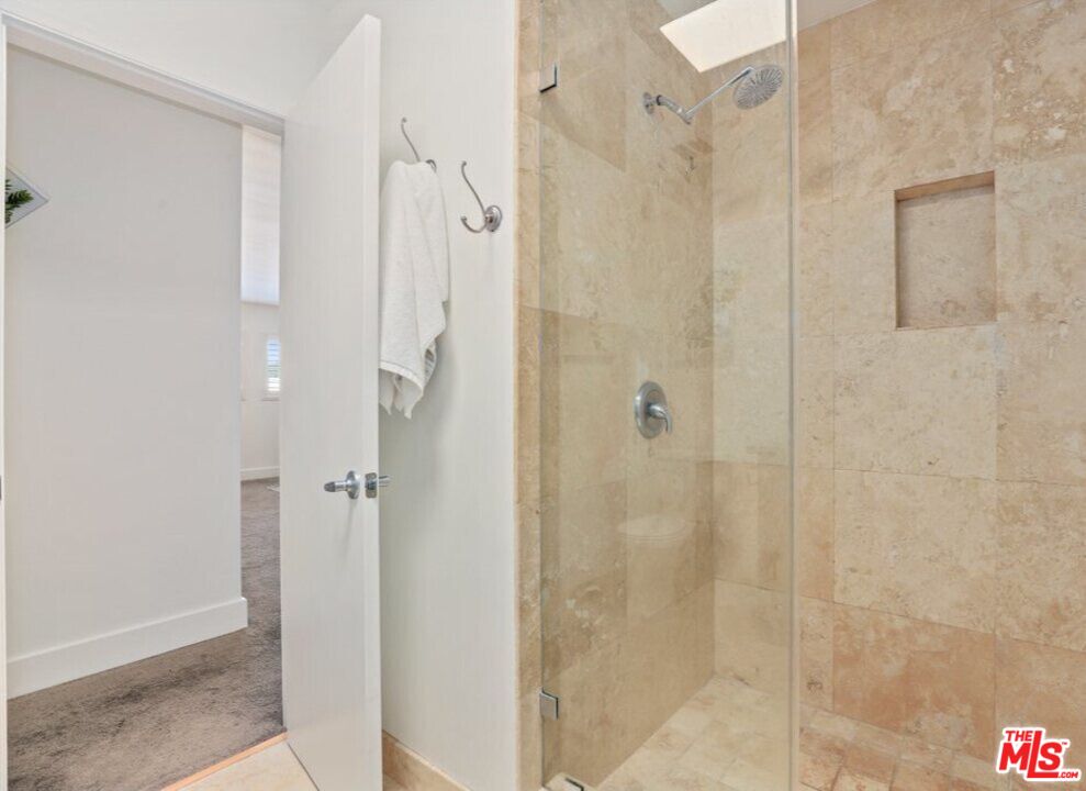 6624 South Springpark Avenue, Unit 5A Los Angeles, CA 90056 - Photo 18 of 23 a bathroom with a shower
