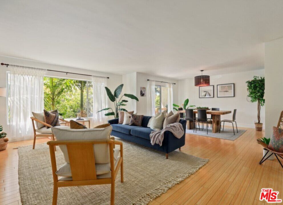 6624 South Springpark Avenue, Unit 5A Los Angeles, CA 90056 - Photo 2 of 23 a living room with furniture and a large window