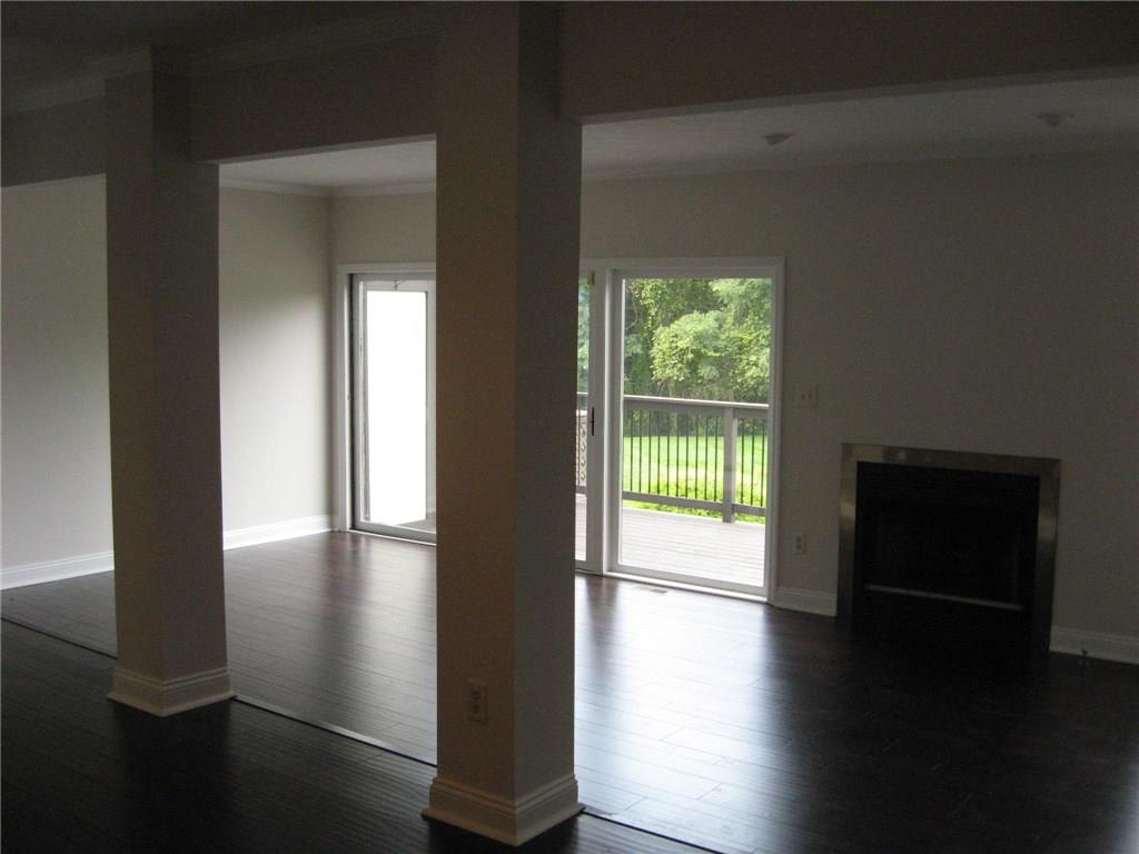 150 Shadow Ridge Drive Pittsburgh, PA 15238 - Photo 2 of 23 SUNKEN LIVING ROOM/FAMILY ROOM W/FP OPENS TO NEW DECK